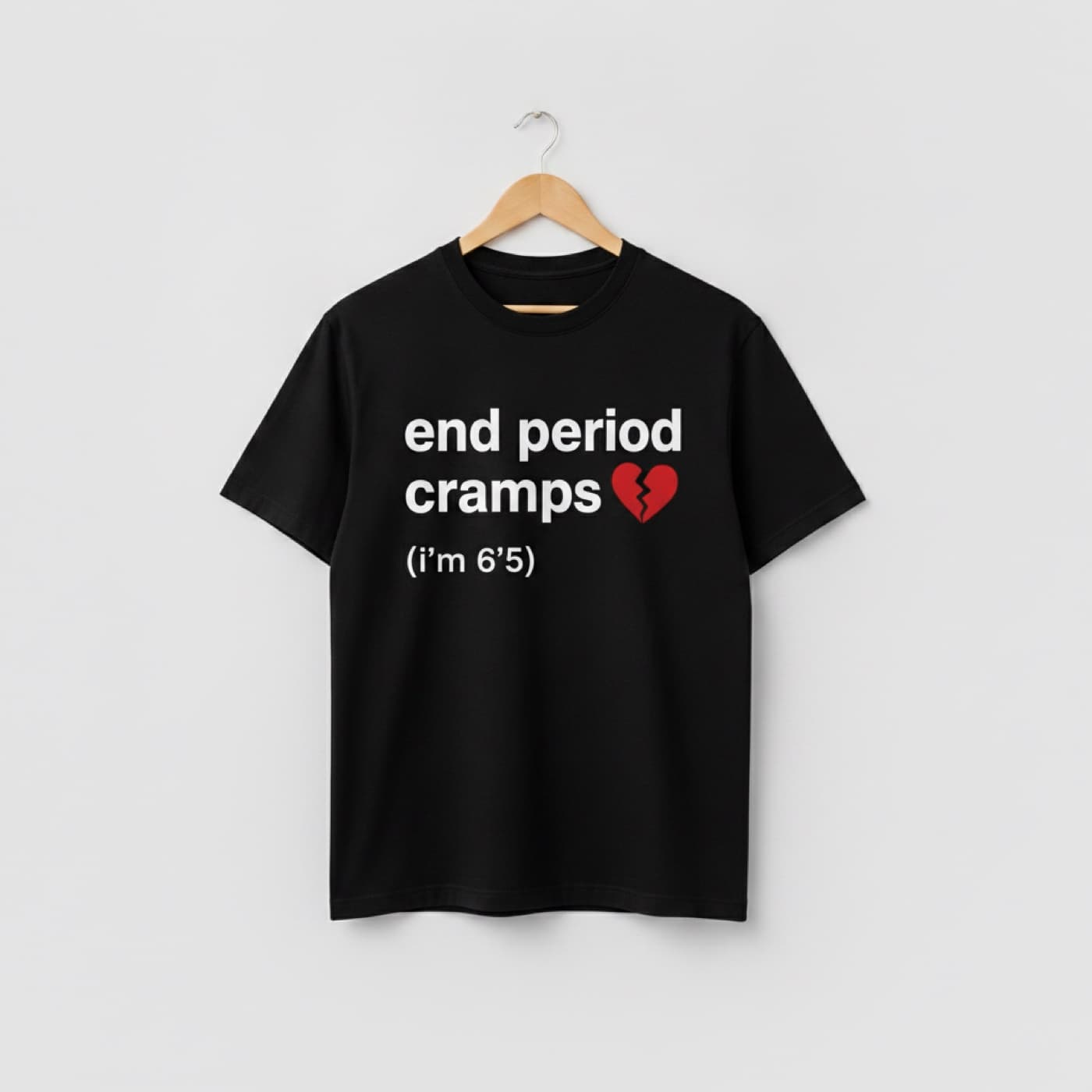 End Period Cramps T-Shirt t-shirt on a hanger